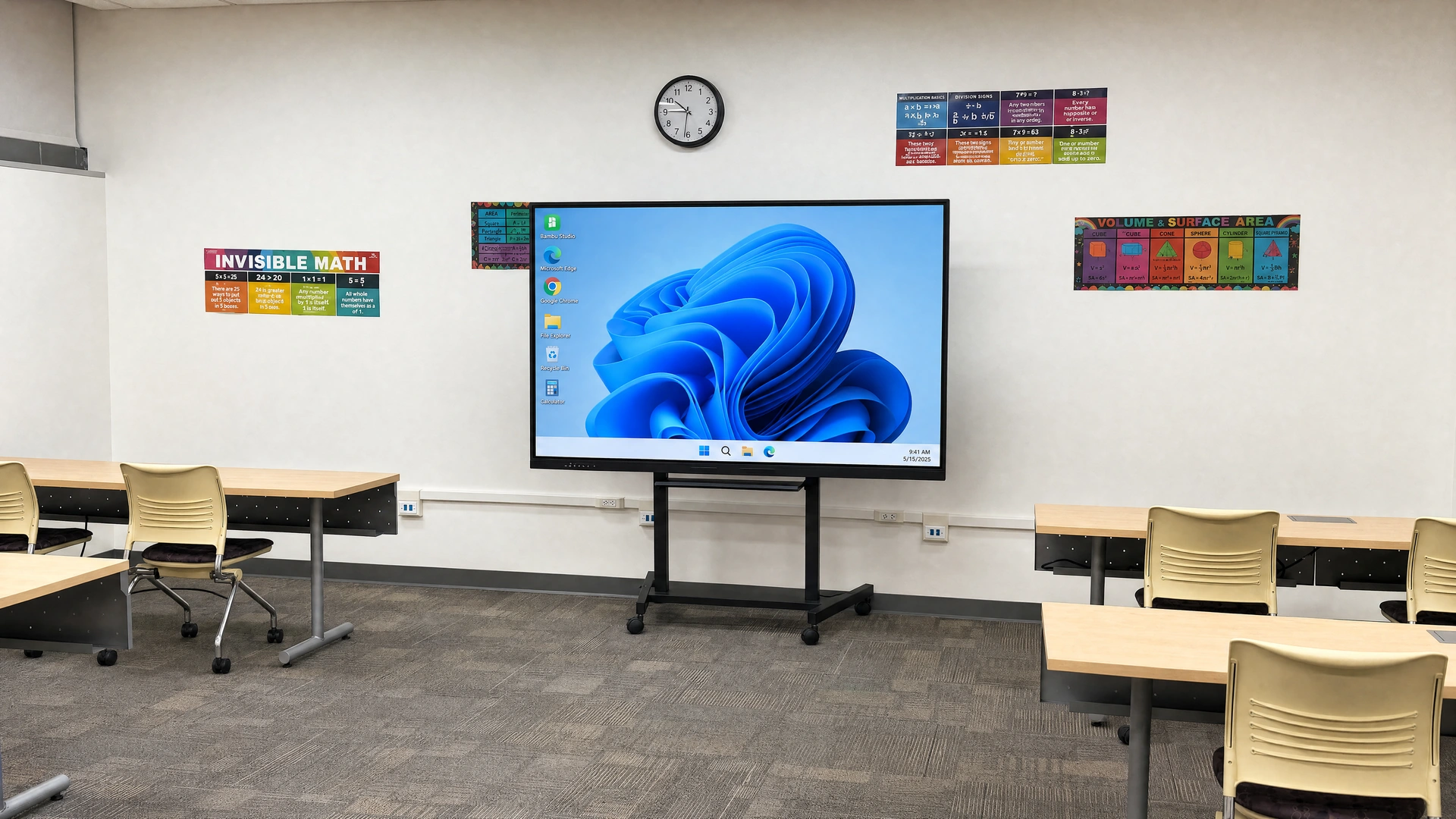 Classroom visualization with colorful maths posters and a Penthia display showing a Windows desktop with Bambu Studio and browser shortcuts